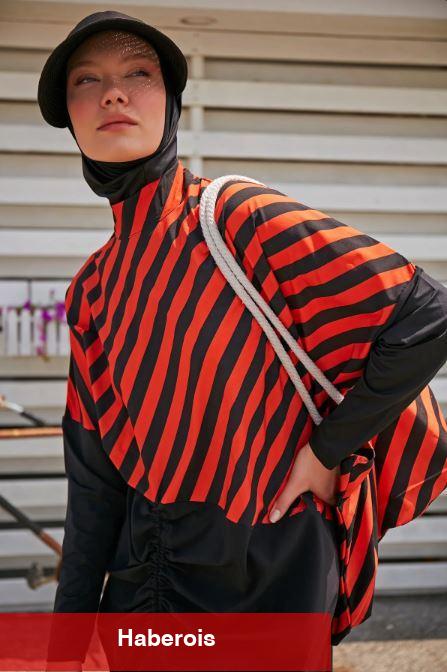 Tesettür mayo defilesinde Halima Aden rüzgarı! Koleksiyonu bu türlü tanıttı