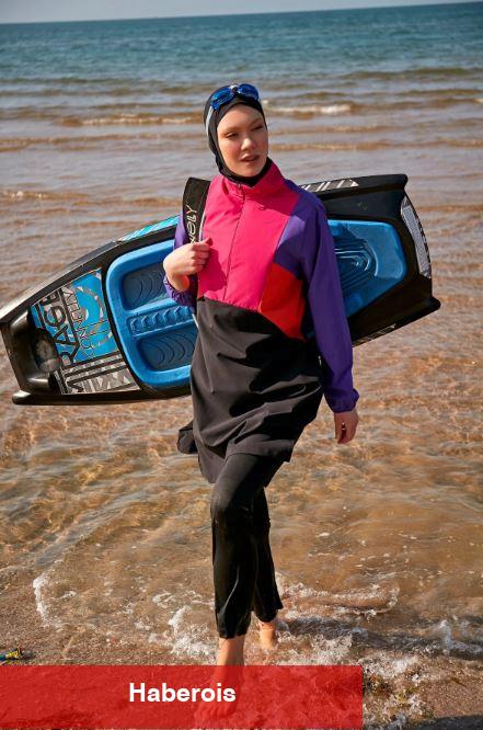 Tesettür mayo defilesinde Halima Aden rüzgarı! Koleksiyonu bu türlü tanıttı