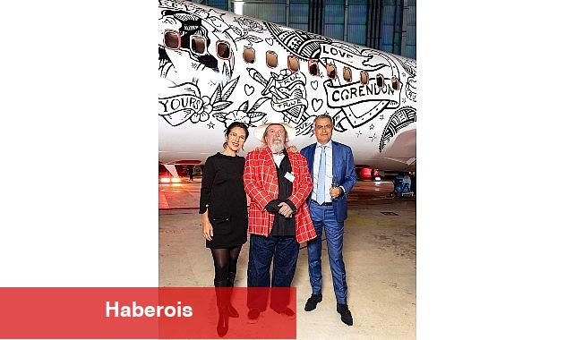 Dünyanın tamamen dövme tasarımlı ilk uçağı havalandı - Haberois Dünyanın tamamen dövme tasarımlı ilk uçağı havalandı